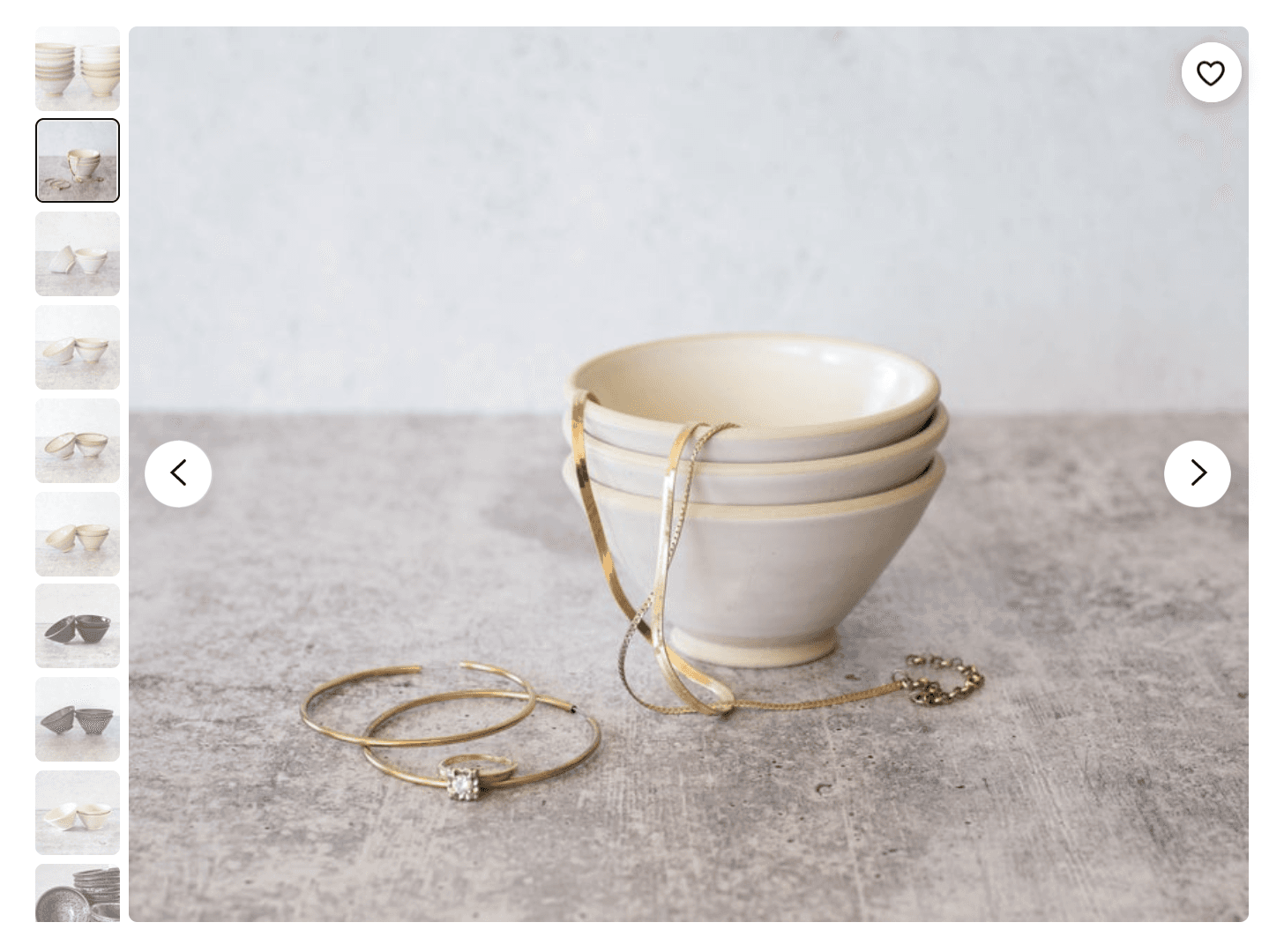 Etsy photo gallery showing ceramic bowls styled with gold jewelry