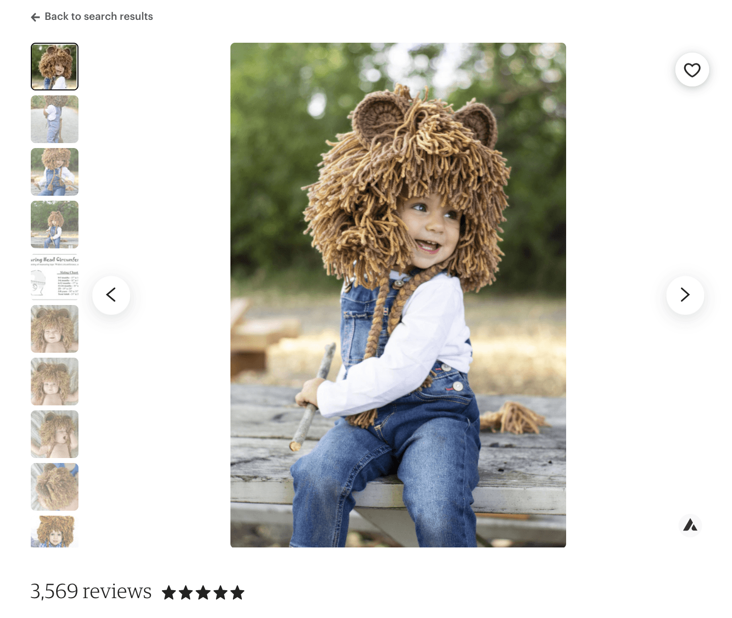 Child modeling a knitted lion hat outdoors in an Etsy listing photo